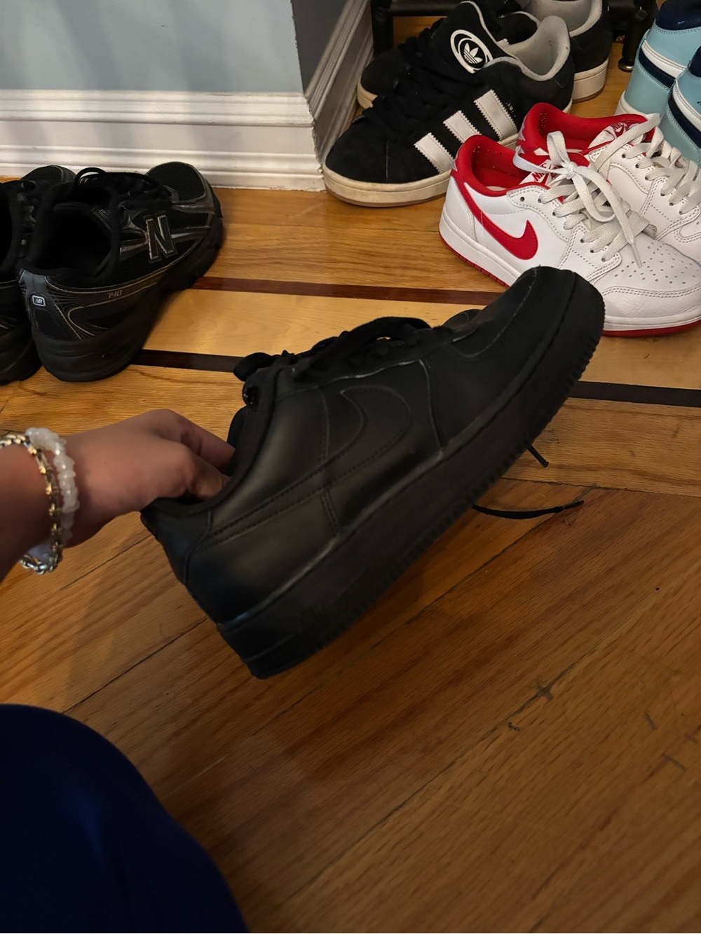 Nike All-Black Leather Sneakers